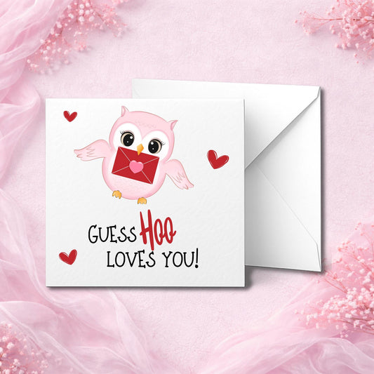 Cute handmade Valentine’s card featuring a pink cartoon owl holding a red envelope with a heart seal. Surrounded by small red hearts and the phrase “Guess Hoo Loves You” in a playful font. Printed on premium white hammered cardstock. Displayed flat lay with crisp white envelope on a soft pink background. Perfect for kids, partners, or loved ones who enjoy sweet punny gifts.